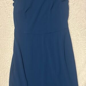 Sleeveless dress with high neck